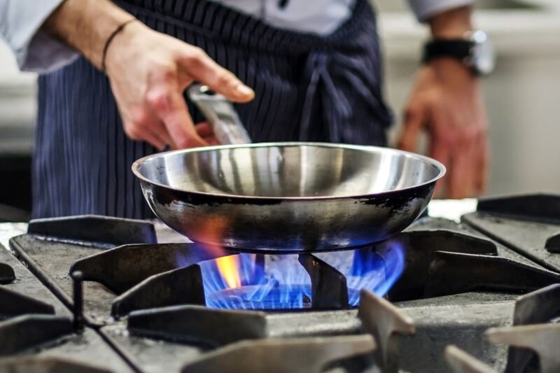 Stainless Steel Pan on a Gas Stove