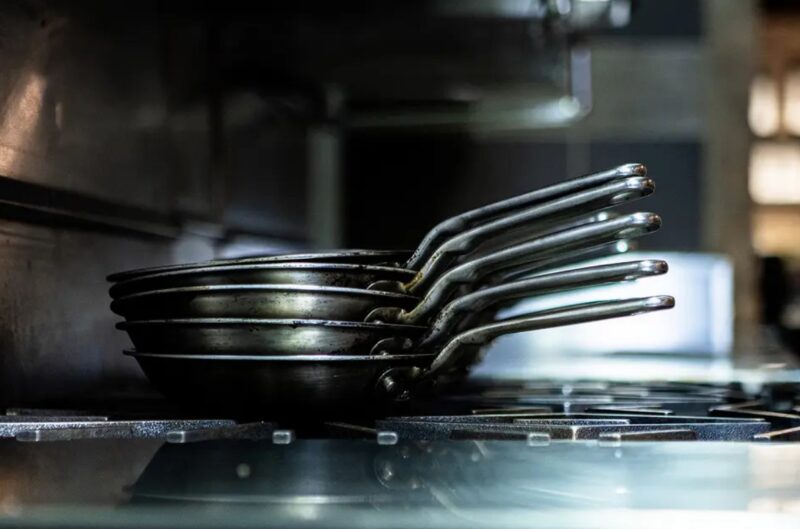 Stacked Aluminum Pans. Concept for Benefits of Aluminum Cookware.