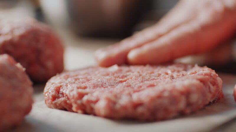 preparing beef burger