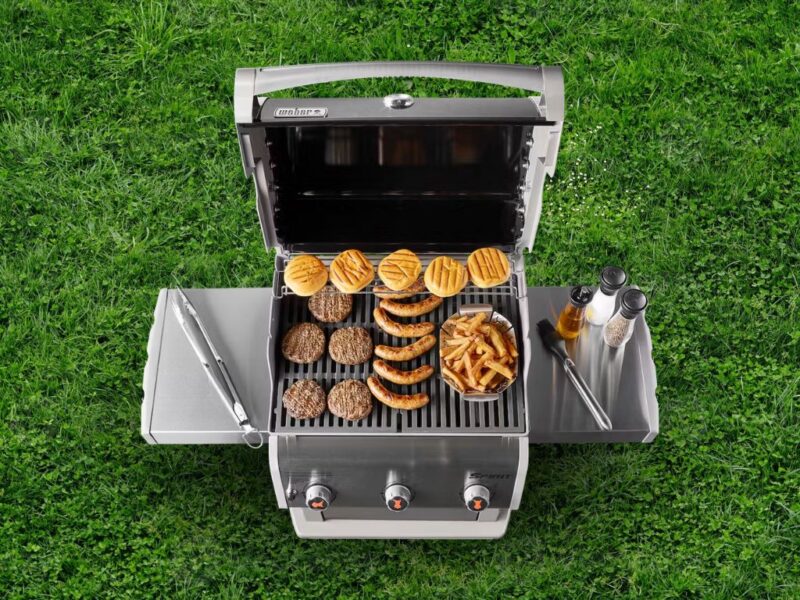 weber gas grill on grass